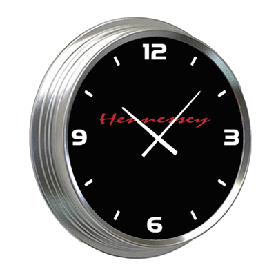 Image of a chrome plated clock with the Hennessey logo on it in red color on a black background
