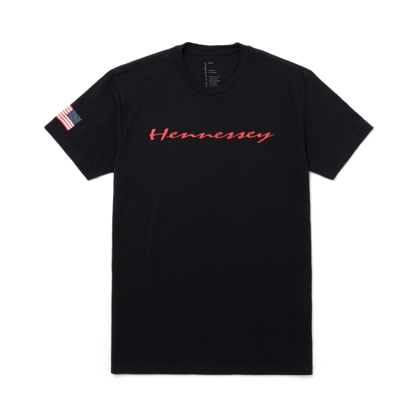 Black tee with Hennessey script imprinted in red on the front of the tee. American flag printed on the right sleeve